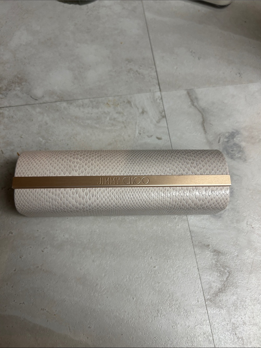 Jimmy Choo Ivory Textured Snake-Embossed Clutch with Gold Bar